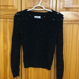 Girl’s black crocheted sweater size 12